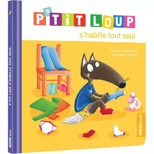 Der kleine Wolf zieht sich alleine an.